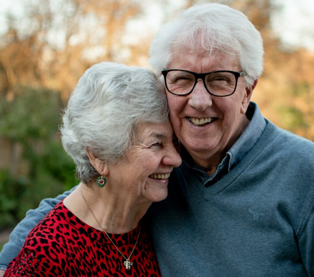 Happy Retired Couple Hugging at monte vista