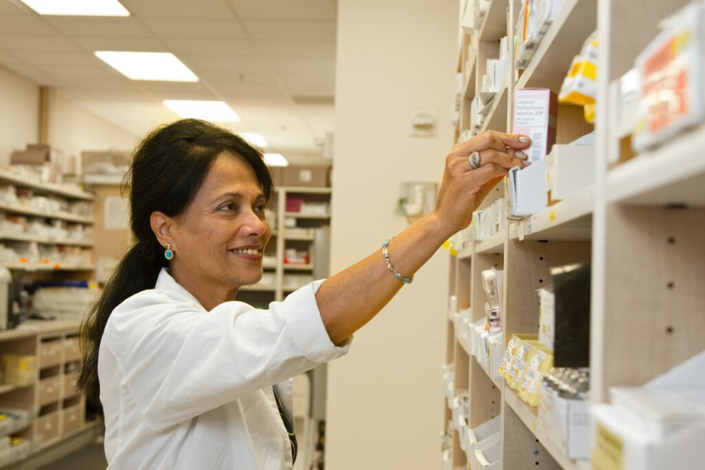 pharmacist with medication at in house care facility at Monte Vista